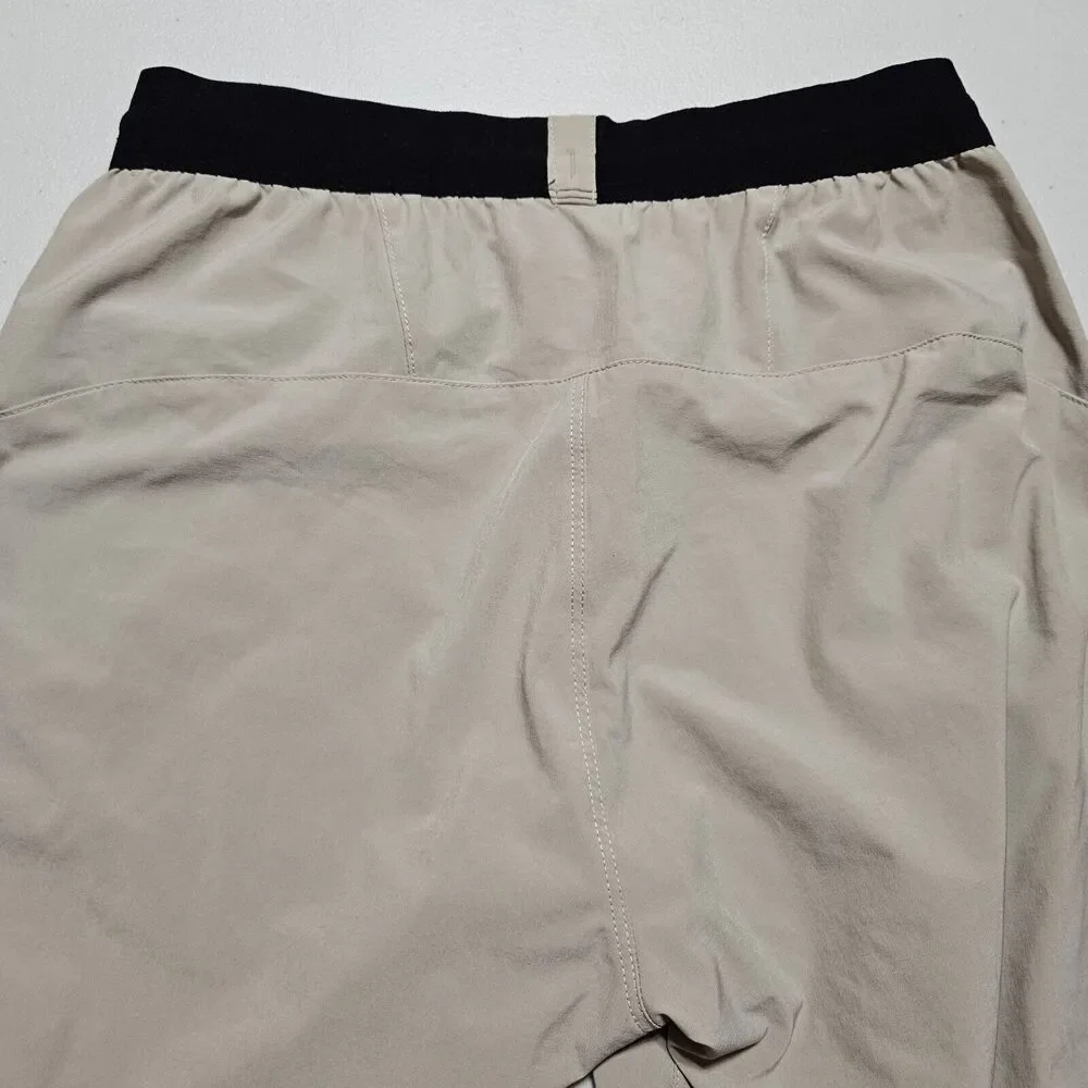 The North Face Essential Pant Mens S Outdoor Stretch TNF Running Zip Ankle Beige